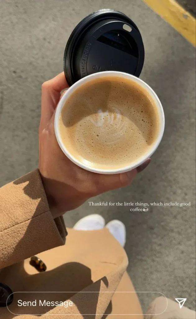 Woman holding a coffee cup with a classy Instagram story quote – Classy Captions For Instagram